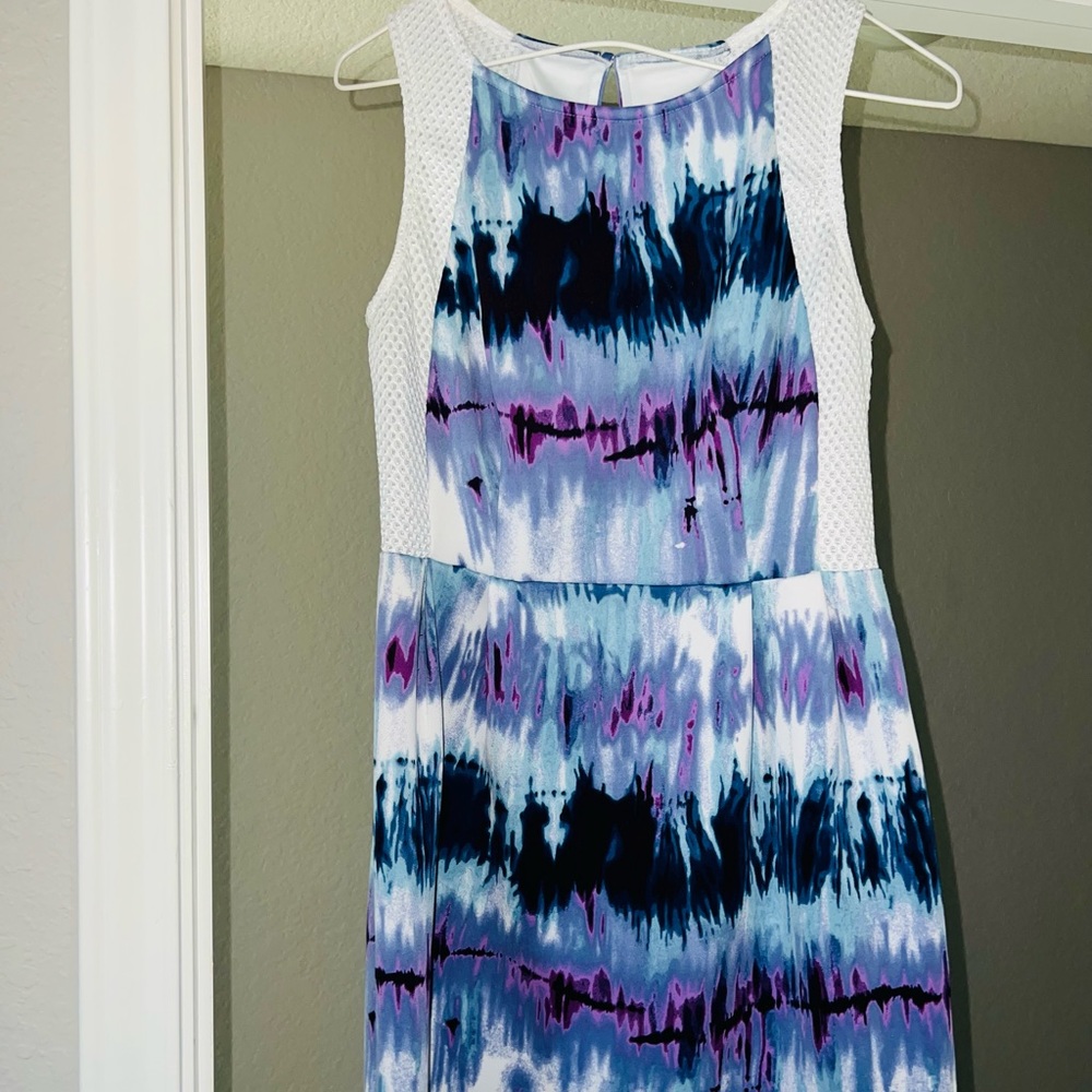 Multi colored, sleeveless, mini dress. Only worn once.